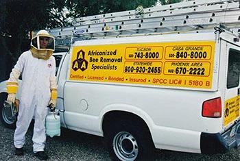 Buckeye bee removal service truck and employee